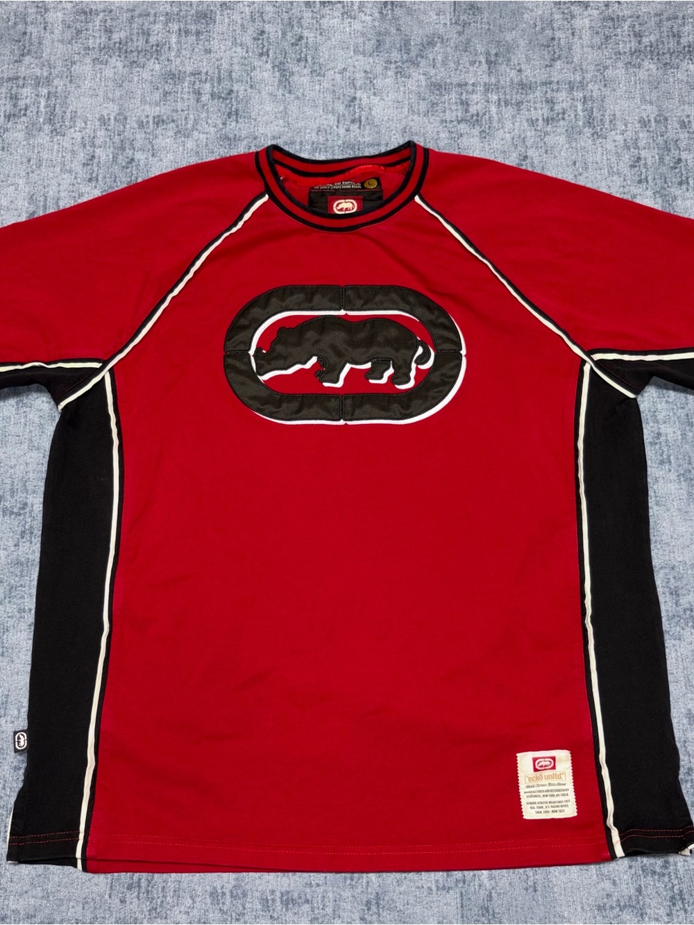 Y2K Ecko Unltd. red & black jersey with white piping and black rhino logo
Size L